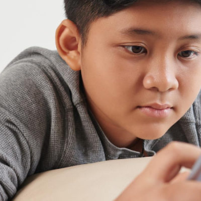 Child reading on a tablet